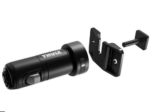 Thule SkiClick Wall Fixation accessory in black, consisting of a storage module and wall mounting hardware.