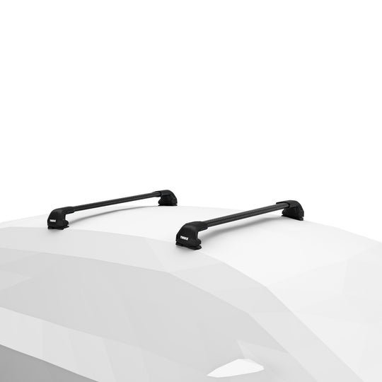 Black roof rack system on a white car