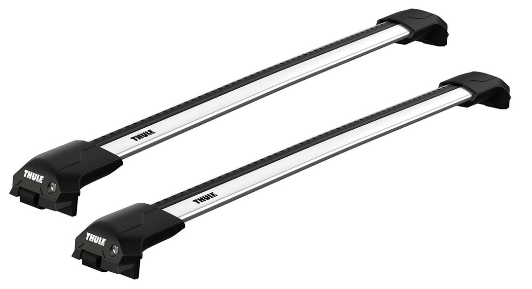 Two Thule roof racks on a white background