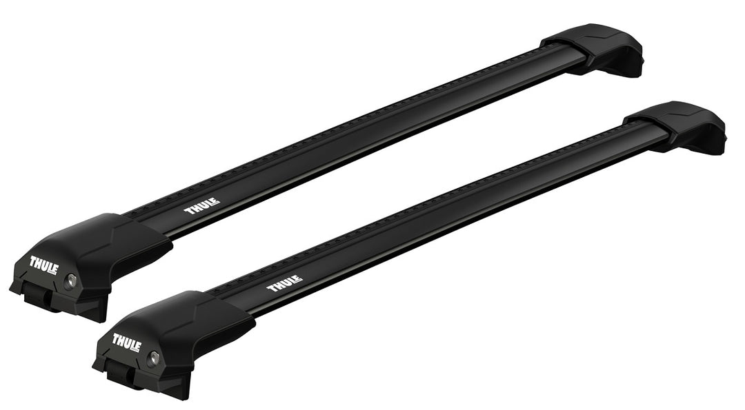 Two black Thule roof racks on a white background