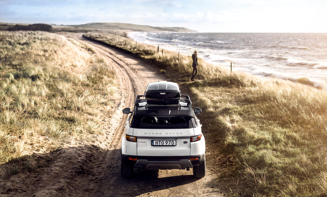 Low profile roof bars and box on range rover