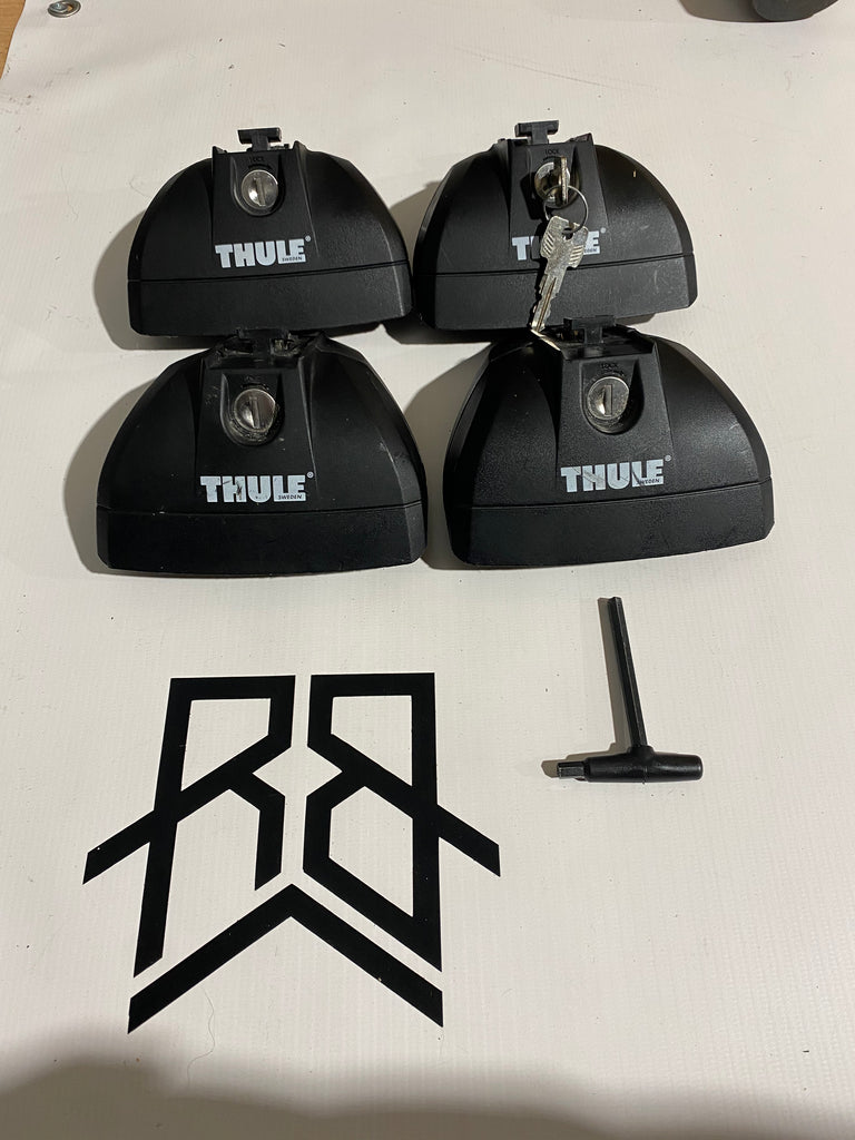 Thule 753 Footpack with two keys and an Allen Flush Rail Fixed Poin Roof Boxed